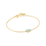 Bracelet en or avec emblème en émail bleu poudre