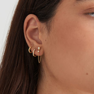 
            
                Load image into Gallery viewer, Gold Sparkle Huggie Hoop Earrings
            
        