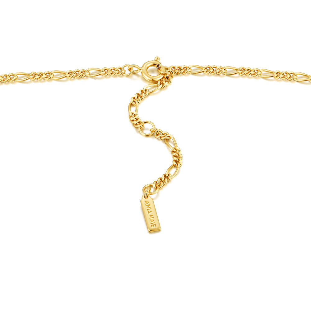 Collier à chaîne Figaro en or avec emblème de la boussole